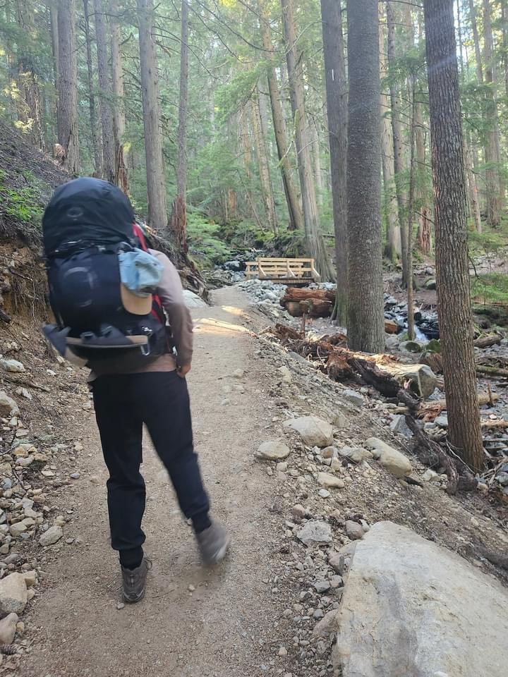 Photo of the Osprey backpack on Sam Benastick’s back.